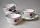 Engelsk kaffe 
service i hvidt 
porcelæn med 
bemalinger af 
roser, 19. årh. 
Bestånde af 5 
kopper, ...