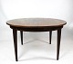 Dining table of 
rosewood with 
three extension 
plates designed 
by Omann Junior 
in the 1960s. 
The ...