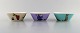Arabia, 
Finland. Tre 
skåle i 
porcelæn med 
motiver fra 
Mumitroldene. 
Sent 
1900-tallet. 
I flot ...