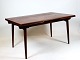 Spisebord med 
hollandsk 
udtræk i teak 
designet af 
Hans J. Wegner 
og fremstillet 
af Andreas Tuck 
...