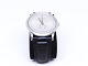 Gucci 
Timepieces 
model 5600M 
armbåndsur med 
sort læderrem 
og a rustfrit 
sål. Uret er 
med ...