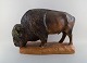 Kuno Norvark (1913-1989) for Bing and Grondahl. Colossal and rare bison ox in 
glazed stoneware. Model Number 7054. Limited Edition # 55/750. Mid 20th century.
