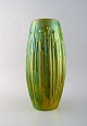 Török János (1932-1996) for Zsolnay. Large modernist vase in glazed ceramics. 
Beautiful golden green eozin glaze. Mid century design, 1950 / 60