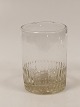 Vandglas 
rørformet med 
fastblæst 
riflet bund
Dansk Glasværk 
ca. år 
1860-1870
H.8,5cm Ø.6cm.