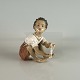 Figur i 
porcelæn med 
motiv af 
siddende pige 
med perler nr. 
1353
Produceret af 
Dahl Jensen
1. ...