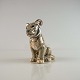 Figur i 
porcelæn med 
motiv af 
siddende 
løveunge nr. 
1275
Produceret af 
Dahl Jensen
1. ...