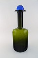 Otto Brauer for 
Holmegaard. 
Stor 
vase/flaske i 
grønt kunstglas 
med blå kugle. 
1960'erne. ...