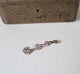 Vedhæng i 8 kt 
guld med tre 
ziakon hjerter 
Stemplet: 333
Længde 3 cm.