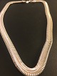 Sølv halskæde 
sildebens 
mønster.
Sølv 925 s
kæde længde: 
51 cm.
Bredde: 1 cm. 
Tykkelse: 3,4 
...