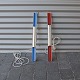 To væglamper i aluminium med blå og rød lakeringDesign af Bent KarlbyProduceret af ...