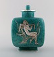 Wilhelm Kåge for Gustavsberg. Argenta art deco ceramic lidded jar decorated with 
nude woman in silver inlay. Sweden 1940