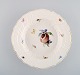 Antik Meissen 
dyb tallerken i 
håndmalet 
porcelæn med 
fersken og 
blomster. 
1800-tallet. 
Måler: ...