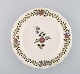 Meissen 
tallerken i 
håndmalet 
porcelæn med 
blomsterdekoration.
 1900-tallet. 
Diameter: 24,5 
...