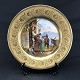 Diameter 20,5 
cm.
Italiensk 
platte fra 1800 
tallets midte, 
dekoreret med 
guld og motiv i 
...