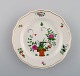 Meissen 
tallerken i 
håndmalet 
porcelæn med 
blomstermotiver.
 Tidligt 
1900-tallet.
Diameter: 16 
...