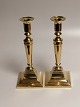 A pair of brass table tops stamped Kobbermøllen