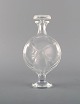 Lalique flakon 
i klart og 
matteret 
kunstglas. 
1980'erne. 
I flot stand.
Indridset ...