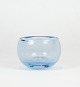 Glas skål i 
isblå farve af 
Per Lütken for 
Holmegaard.
6,5 x 8 cm.