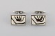 A pair of Royal Copenhagen cufflinks in sterling silver and porcelain. 1960 / 
70s.

