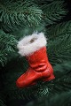 Old Christmas 
decorations for 
the Christmas 
tree in the 
form of a 
painted boot 
made of ...