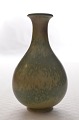 Vase aus den 1950er Jahren
Glasur in gelbbraunen und himmelblauen Tönen auf Steinzeugkorpus
Gunnar Nylund für Rorstrand