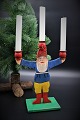 Old Swedish Santa Claus candlestick in carved wood from the 50s, painted with a 
fine patina.
H:29cm.