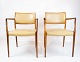 Et par N.O. 
Møller 
armstole, model 
65, i 
palisander og 
lyst læder, 
fremstillet hos 
J.L. Møller i 
...