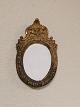 Lille forgyldt 
rococo spejl ca 
år 1760
Mål 26 x 16cm.