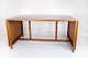 Sofabord i teak 
med 
udtræksplader 
af dansk design 
fra 1960erne. 
Bordet er i 
flot brugt 
stand.
H ...