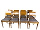 Sæt af 8 
spisestuestole 
af birketræ og 
polstret med 
blåt stof fra 
1930erne. 
Stolene er i 
flot ...