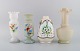 Fire antikke 
vaser i 
håndmalet 
mundblæst 
opalineglas. 
Ca. 1900.
Største måler: 
25,5 x 12,5 ...
