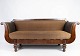 Antik sofa polstret med brunt stof of stel af mørkt træ fra 1860. Sofaen er i flot brugt stand. ...