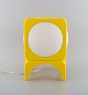 Skandinavisk 
designer. Retro 
bordlampe i 
hvid og gul 
plast. 
1970'erne.
Måler: 29 x 
21,5 cm.
I ...