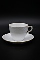 Royal Copenhagen Tradition, White Half lace with gold edge coffee cup. 
Cup Dia: 7,5 cm.  RC#1275/756.