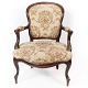 Rococo armchair of rosewood and upholstered with floral fabric, in great antique 
condition from around 1880. 
5000m2 showroom.