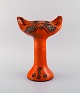 Swedish ceramicist. Unique sculpture in orange glazed stoneware. Cat. 1970s.
