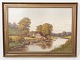 Maleri på 
lærred med 
naturmotiv og 
forgyldt ramme 
fra 1940erne.
53 x 72 cm.