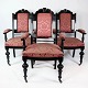 Tre armstole af mørkt træ og polstret med rødt stof, i flot antik stand. Stolene er i flot brugt ...