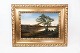 Maleri på 
lærred med 
natur motiv og 
med forgyldt 
bred ramme fra 
1910erne.
60 x 77 cm.
