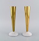Tom Dixon (b. 1958), British designer. A pair of candlesticks in brass and 
marble. Clean design, 21st Century.
