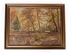 Maleri på 
lærred med skov 
motiv og mørk 
træramme, 
signeret V. 
Jespersen fra 
1930erne.
60 x 79 cm.