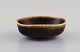 Eva Stæhr-Nielsen for Saxbo. Miniature bowl in glazed stoneware. Beautiful glaze 
in brown shades. Mid-20th century.
