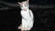 Bing & Grøndahl 
Figur, Hvid kat 
med pletter 
Kat, der 
slikker sig.
Dek nr 2466
Højde 12 ...