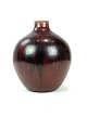 Keramik vase med okseblod farvet glasur af Kresten Bloch for Royal Copenhagen. 
5000m2 udstilling.
Flot stand
