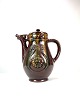 Keramik kande 
med brun glasur 
og dekoreret 
med mønster i 
jugend stil fra 
omkring 
1940erne. ...