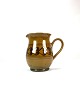 Keramik kande i brune farver af Abbednæs Potteri.
5000m2 udstilling.
Flot stand
