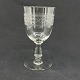 Højde 15,5 cm.
Fint dekoreret 
vinglas med 
ætset motiv 
rundt om cuppa 
fra Baccarat.
Det er ...