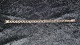 #Bismarck 
Armbånd  14 
karat Guld
Stemplet 585 
HMH 1959-1969 
Henrik Munck 
Hansen	
Længde 19 cm 
...