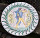 Anders Høy 
dish, 20th 
century 
Denmark. 
Polychrome 
decoration of 
soldier with 
shield and 
lance. ...