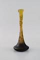 Antique Emile Gallé vase in yellow frosted and green art glass carved in the 
form of flowers and foliage. Early 20th century.

